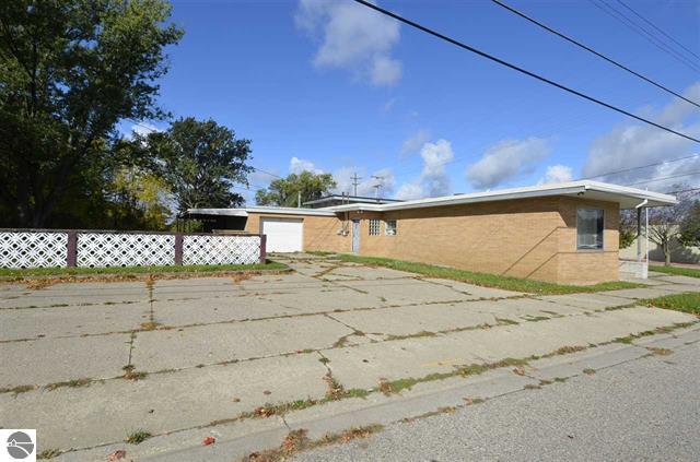 Multi- family residential building will lay out for 8 apartments for sale in Cadillac, Michigan